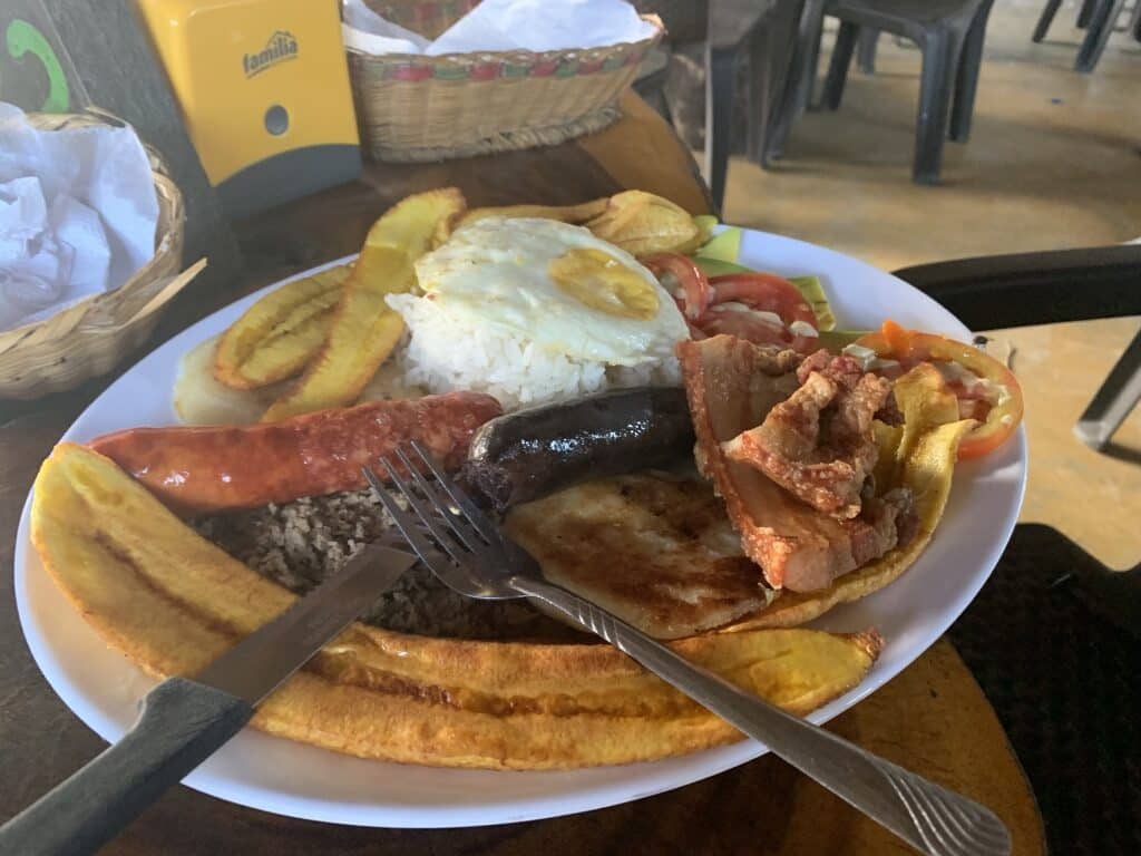 A plate full of Bandeja Paisa, Colombia's national dish.